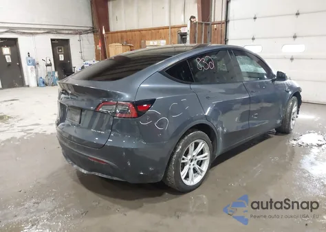 2023 Tesla Model Y Awd/Long Range Dual Motor All-Wheel Drive z USA, uszkodzony, nr VIN 7SAYGDEE4PA074009